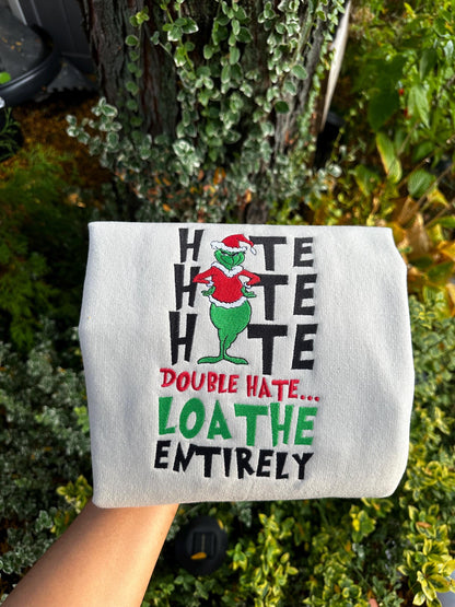Funny Grinch Christmas Embroidered Sweatshirt and Hoodie – “Loathe Entirely”