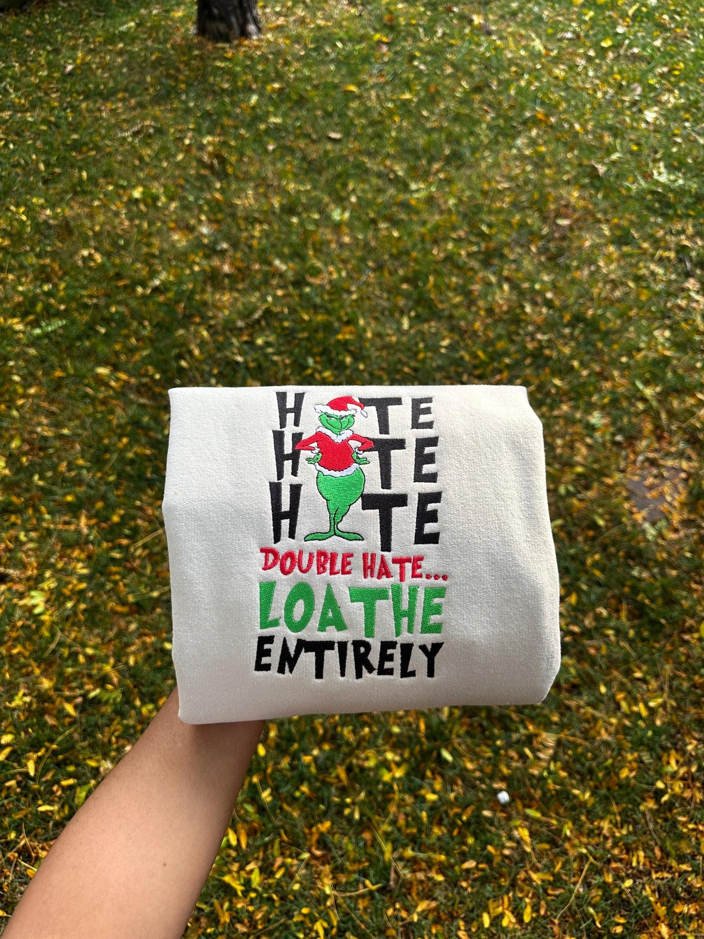 Funny Grinch Christmas Embroidered Sweatshirt and Hoodie – “Loathe Entirely”